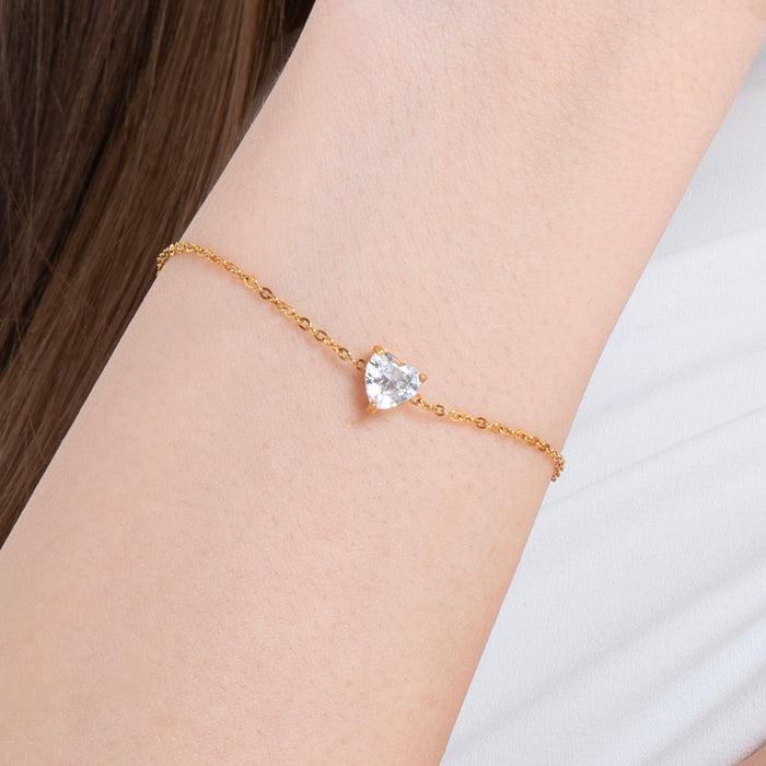 BRACCIALE DONNA IN ACCIAIO E IP GOLD CON CUORE CRISTALLO BIANCO