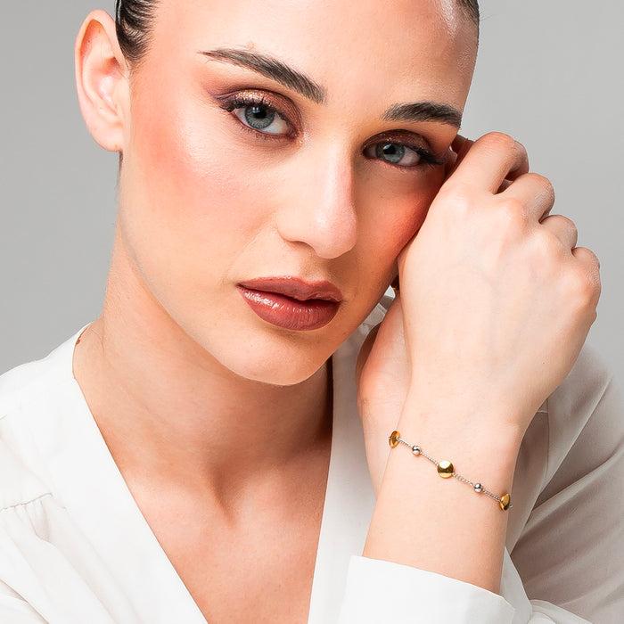 BRACCIALE DONNA IN ACCIAIO CON ELEMENTI IN ACCIAIO IP GOLD E CRISTALLI BIANCHI