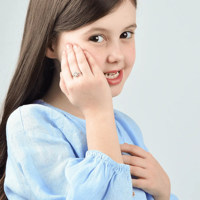 ANELLO BAMBINA IN ACCIAIO CON FIORE