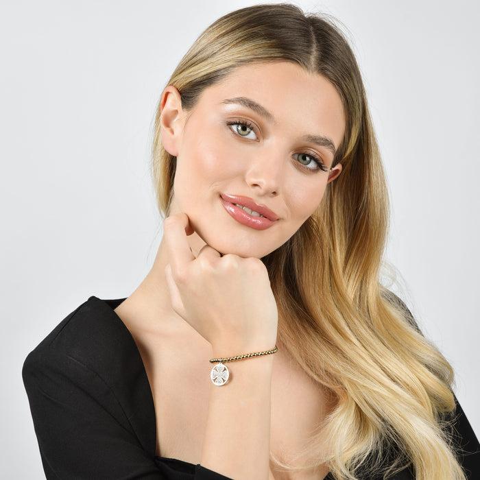 BRACCIALE IN ACCIAIO IP GOLD CON QUADRIFOGLIO IN ACCIAIO CON CRISTALLI BIANCHI