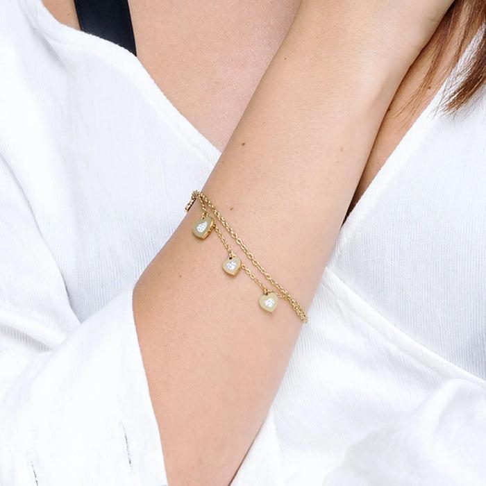 BRACCIALE DONNA IN ACCIAIO IP GOLD CON CUORI E CRISTALLI BIANCHI