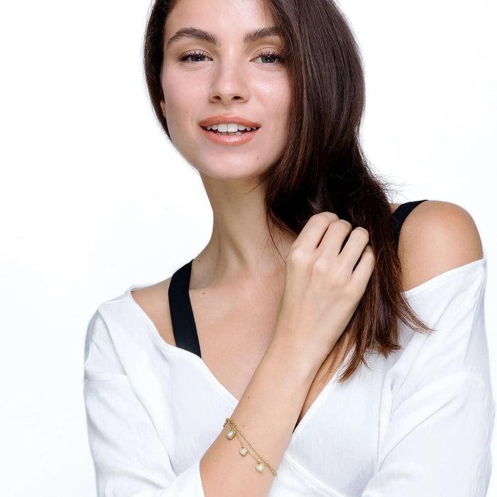 BRACCIALE DONNA IN ACCIAIO IP GOLD CON CUORI E CRISTALLI BIANCHI