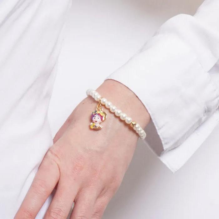 Bracciale in Metallo elastico con sfere bianche