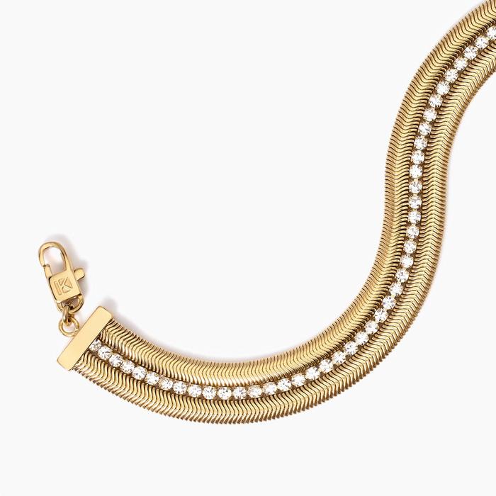 Bracciale dorato con doppia catena e tennis