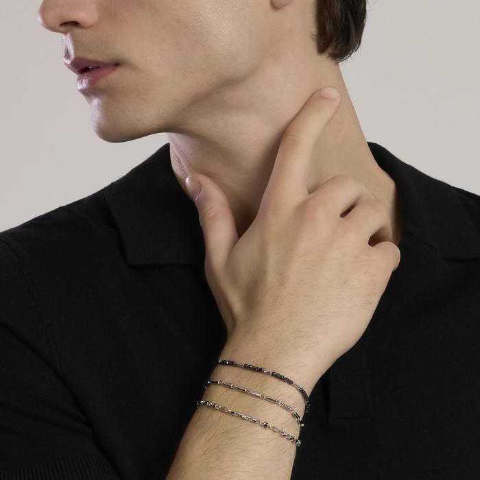 Bracciale regolabile con cilindri lucidi e incisioni nere ROLLER
