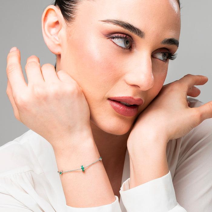 BRACCIALE DONNA IN ACCIAIO, BUSSOLOTTO ED ELEMENTI CON ZIRCONI VERDI