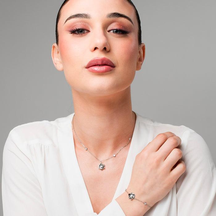 BRACCIALE DONNA IN ACCIAIO, FIORE ED ELEMENTI CON ZIRCONI BIANCHI