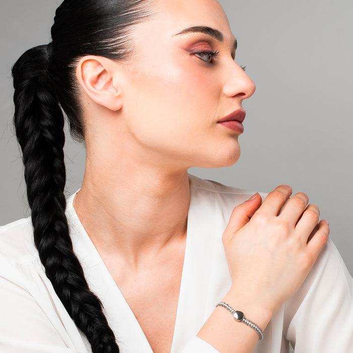BRACCIALE DONNA TENNIS IN ACCIAIO CON ELEMENTO CENTRALE IN ACCIAIO E CRISTALLI