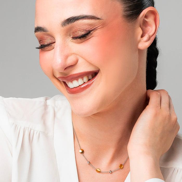 COLLANA DONNA IN ACCIAIO CON ELEMENTI IN ACCIAIO IP GOLD E CRISTALLI BIANCHI
