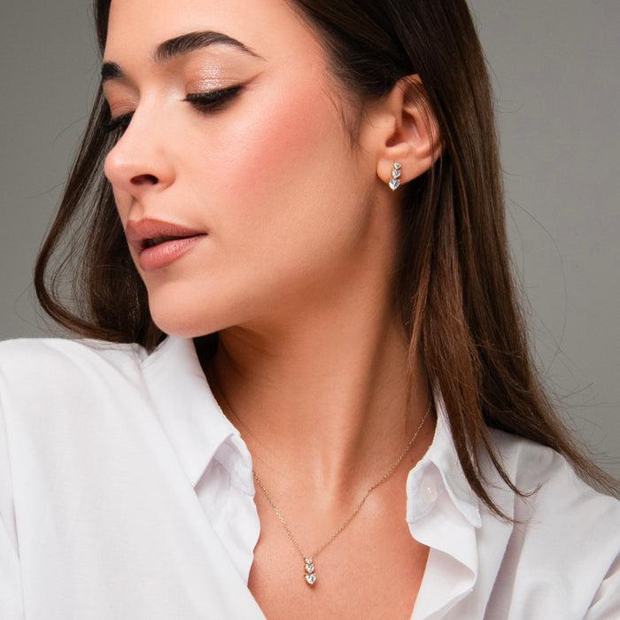 MONO ORECCHINO DONNA IN ACCIAIO IP GOLD CON CUORI CON ZIRCONI BIANCHI
