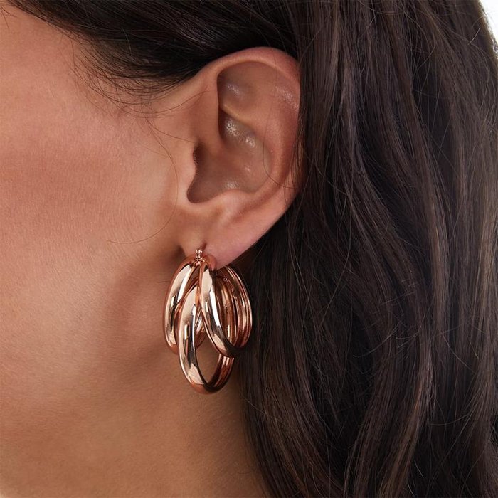 Orecchini in bronzo dorato rosa