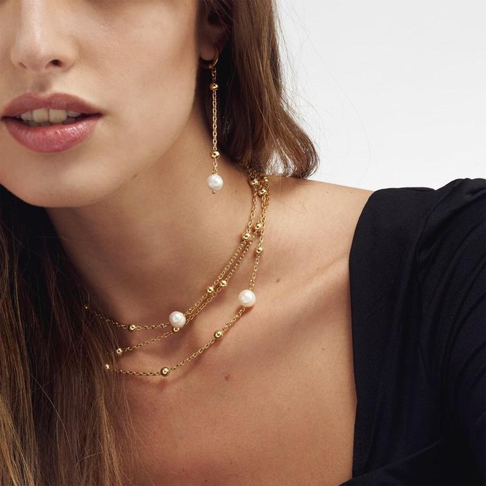 Collana in bronzo dorato e perle naturali