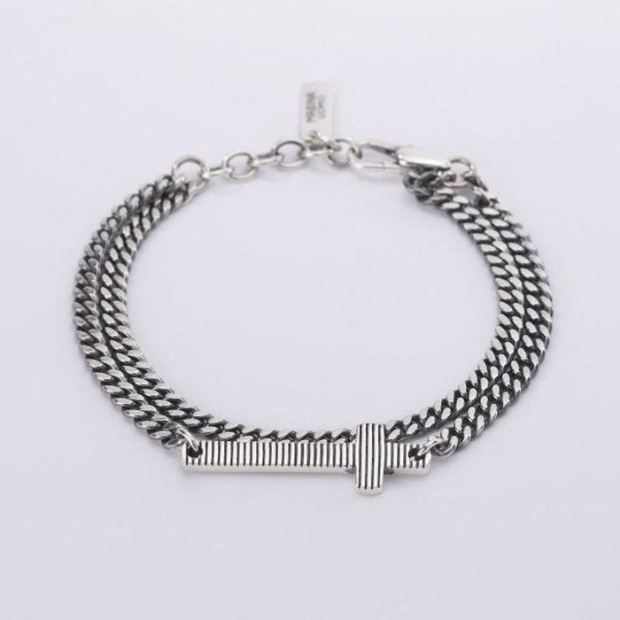BRACCIALE MULTICHAIN GROUMETTE CON CROCE RIGATA