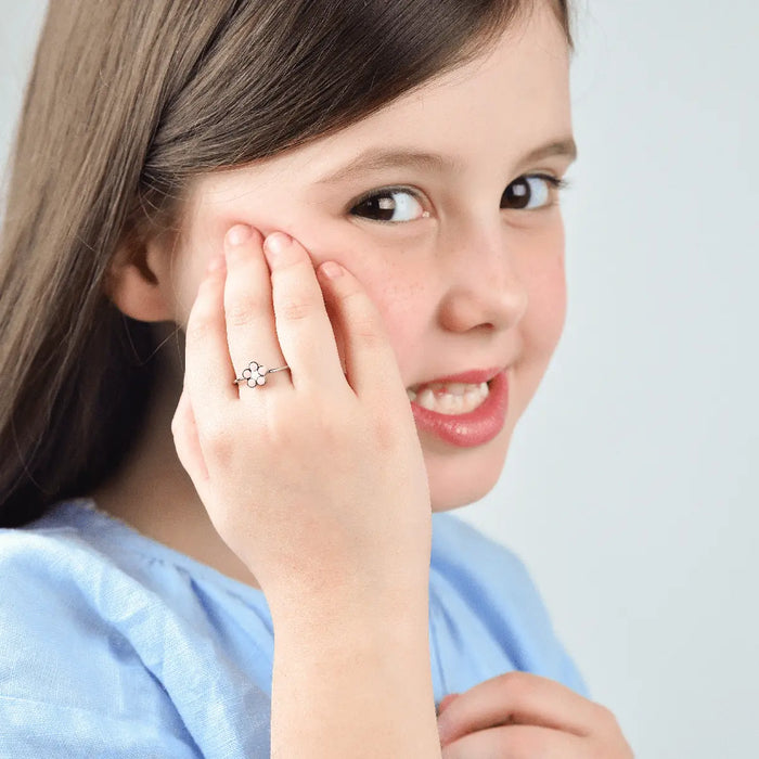 ANELLO BAMBINA IN ACCIAIO CON FIORE