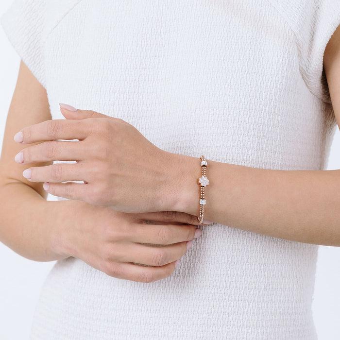 BRACCIALE IN ACCIAIO IP ROSE CON QUADRIFOGLIO CON CRISTALLI BIANCHI