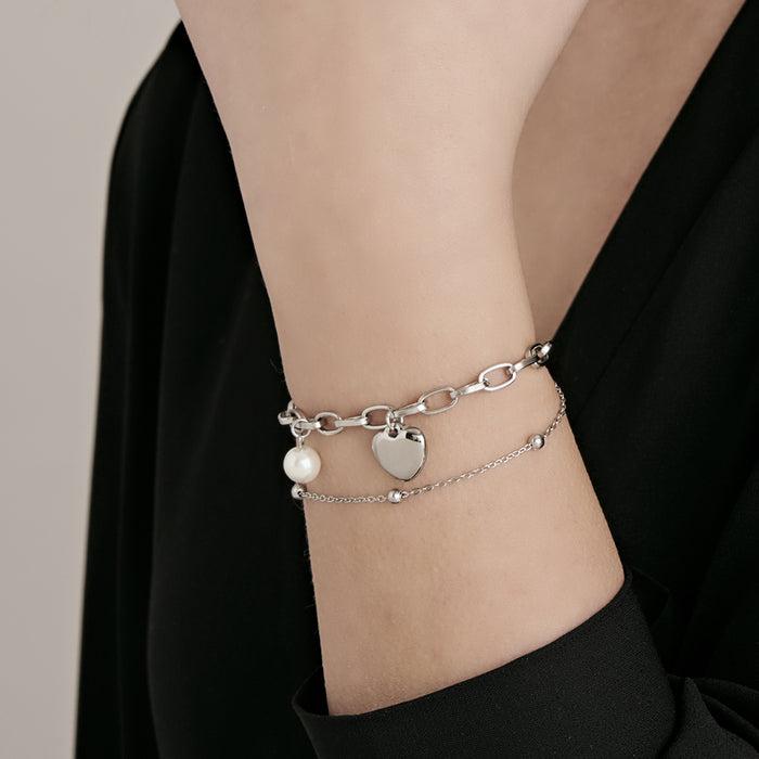 BRACCIALE DONNA IN ACCIAIO IP GOLD CON CUORE E PERLE
