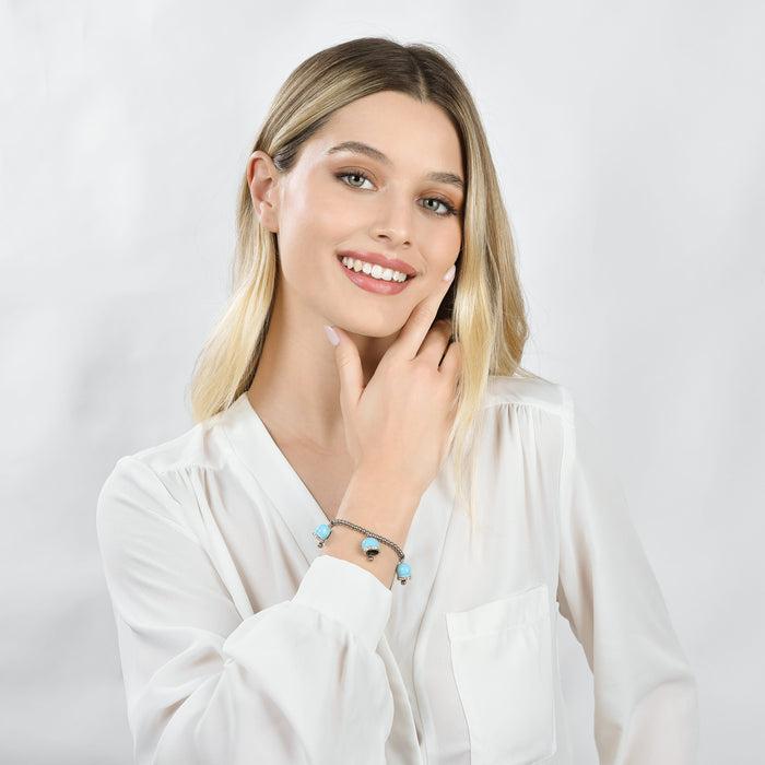 BRACCIALE DONNA IN ACCIAIO CON CAMPANELLE CON SMALTO TURCHESE E CRISTALLI