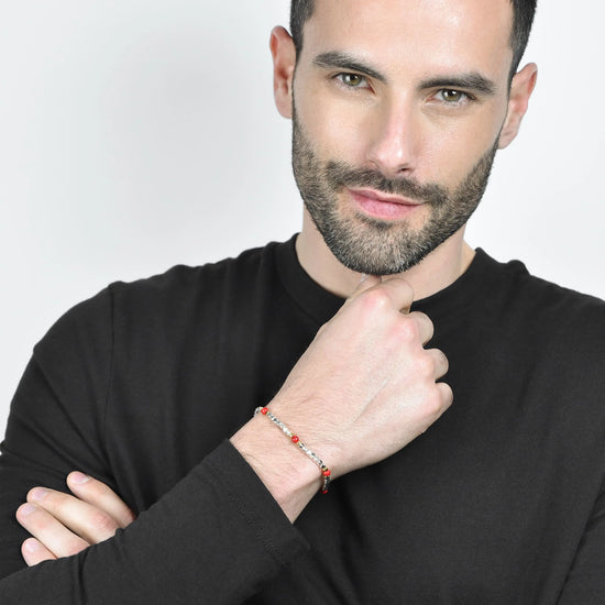 BRACCIALE UOMO IN ACCIAIO CON PIETRE ROSSE ED ELEMENTI IP GOLD