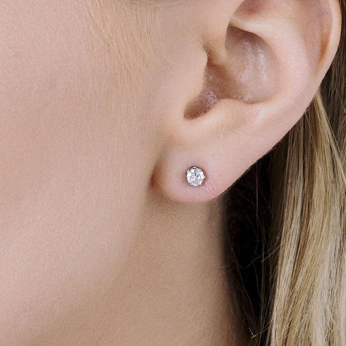 Orecchini punti luce in acciaio con cristallo bianco da 4mm