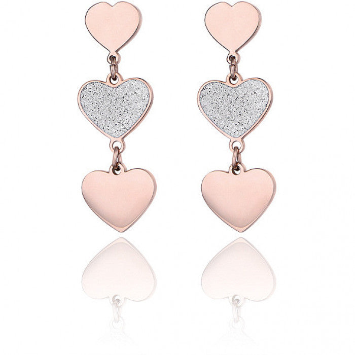 Orecchini pendenti cuori glitter